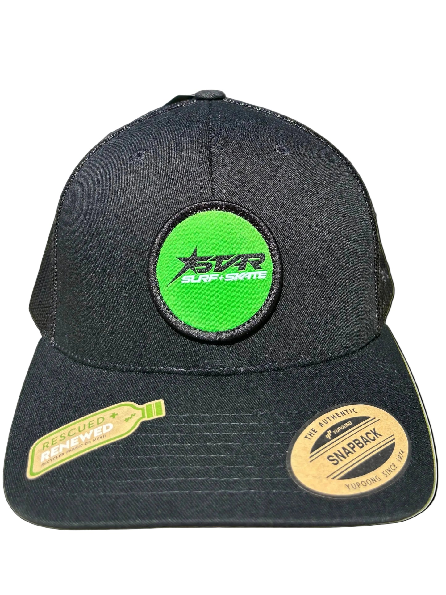 Black cap with green and yellow patches on a white background