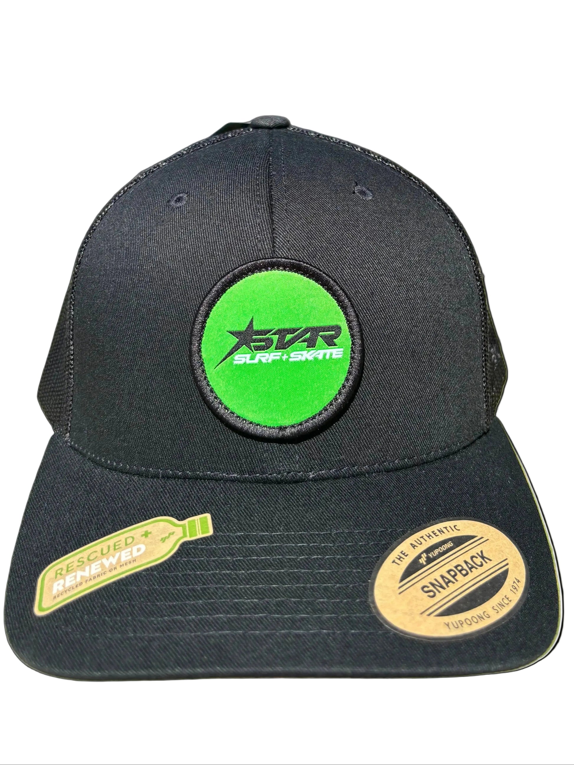 Black cap with green and yellow patches on a white background